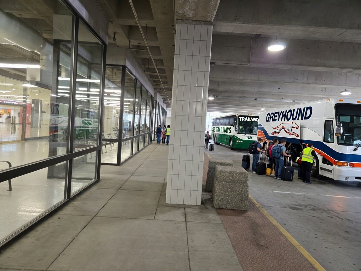 Rendering of coaches berthed at the Concourse deck with passengers boarding